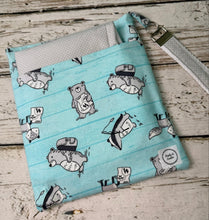 Load image into Gallery viewer, A fabric diaper bag pouch with a light blue and white striped pattern featuring bears shown on a rustic white-washed wooden background.
