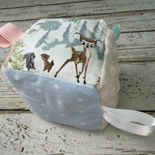 Load image into Gallery viewer, Sensory baby block made with Bambi print fabrics in blue and pink
