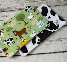 Load image into Gallery viewer, Burp cloth set of 2 in farm animal print and cow print.
